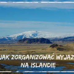 Krajobraz Islandii z ośnieżonymi górami w tle. Tekst: "Jak zorganizować wyjazd na Islandię".