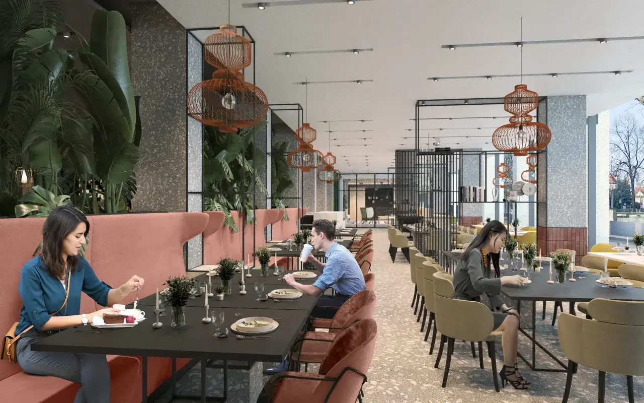 Elegancka restauracja w jednym z najnowszych hoteli w Polsce. Wnętrze zdobią bujna roślinność i stylowe lampy.